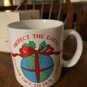 Russ White Mug with Red and Green Earth Design